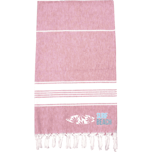 A pink 100% cotton Turkish towel featuring white stripes and fringe edges, with a logo design on one side.