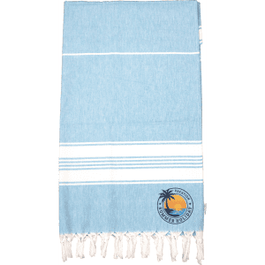 A light blue Turkish towel with white stripes and a circular logo featuring a palm tree and sun.