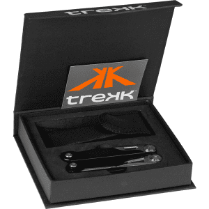 A black multi-tool set is displayed in an open box with a logo and a storage band.