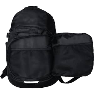 A black backpack with a front pocket, featuring a logo. It has a sleek design suitable for travel.