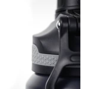 A drink bottle with a grey lid and textured grip, featuring a black body and a prominent attachment loop.