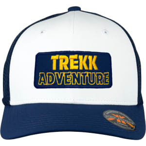 A white and navy trucker cap featuring an embroidered patch with the words "TREKK ADVENTURE" and a logo.