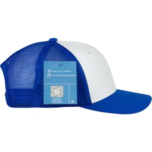 A Turbine Trucker Cap featuring a blue and white design with a mesh back and a branding tag.