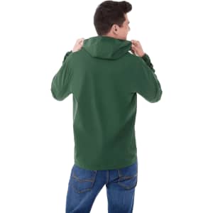 A man wearing a green packable rain jacket with a hood, viewed from the back. The jacket has a logo on it.