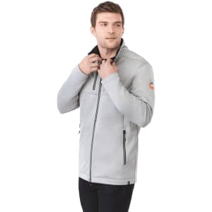 A grey men's softshell jacket featuring a zip front and zippered pockets, worn by a model with a logo on the sleeve.