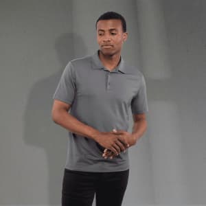 A grey polo shirt for men with a collar and short sleeves, featuring a logo.