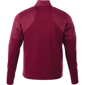A burgundy men's performance jacket featuring a full zip and thumb holes, with a textured design and a logo.