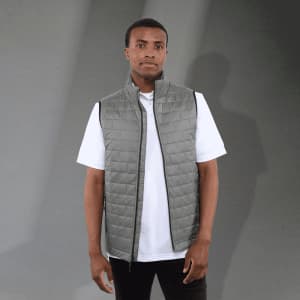 A lightweight, packable insulated puffer vest in grey, featuring a zip closure and a simple design.