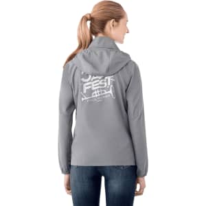 A packable women's rain jacket in grey with a hood and a logo on the back.