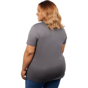 A woman is wearing a grey polo shirt, showing the back view. The shirt has short sleeves and a fitted design.