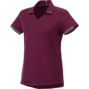 A maroon women's short sleeve performance polo with grey accents and a v-neck design. It features a logo.