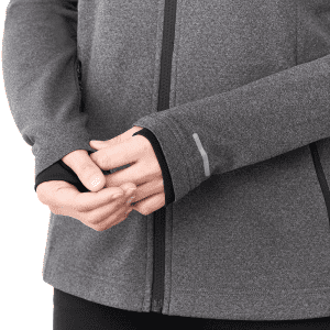 A close-up of a women's grey eco knit jacket with a fitted design and long sleeves. It features a logo.