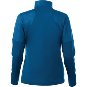 A women's full zip performance jacket in blue with thumb holes, featuring a textured back and shoulder detailing.
