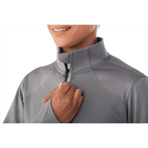 A grey women's performance jacket with a full zip and thumb holes, featuring a high collar and minimalistic design.