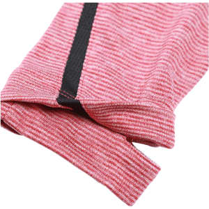 A close-up of a pink striped fabric with a contrasting black trim, showcasing the texture and design of a half zip jumper.