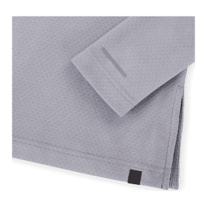 A light grey eco-friendly quarter zip jacket for women, featuring minimalist design and a logo.