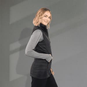 A lightweight packable insulated puffer vest in black, featuring a sleek design and a high neckline.