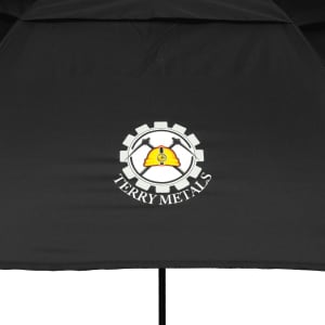 A black vented golf umbrella featuring a logo with a gear design.