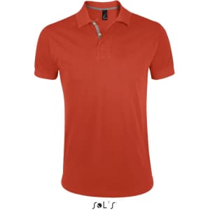A red polo shirt made of 100% ring spun cotton with a sleek design and a logo on the label.