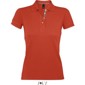 A women's polo shirt in vibrant orange, made from 100% ring spun cotton, featuring a collar and button placket.