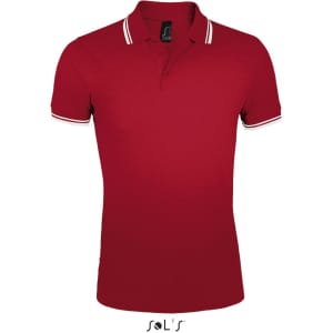 A red polo shirt made from 100% ring spun cotton, featuring a contrasting collar. Includes branding on the tag.