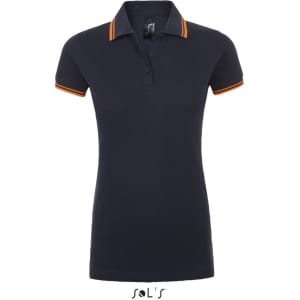 A women's polo shirt in navy blue with orange collar stripes, made from 100% ring spun cotton. Features branding.