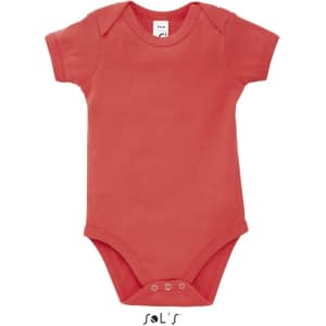 A coral baby bodysuit with short sleeves and snap closures at the bottom, featuring a logo tag.