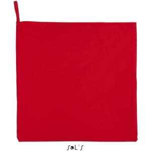 A red microfibre towel measuring 120cm x 70cm, featuring a loop for easy hanging. It has a logo at the bottom.