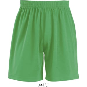 A pair of green sports shorts with an elastic waistband. Features a logo at the bottom.