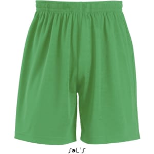 Green sports shorts for kids with an elastic waistband and loose fit, featuring a logo at the bottom.