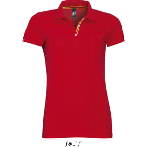 A red women's polo shirt made of 100% ring spun cotton, featuring a logo and contrasting detailing.