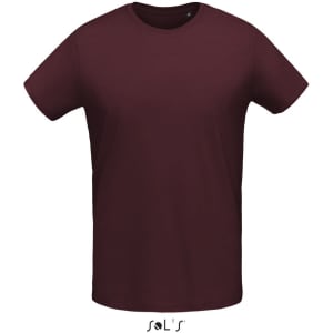 A burgundy men's round neck T-shirt made of 100% semi-combed ring spun cotton, featuring a logo.