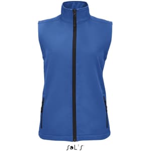 A blue women's softshell vest featuring a high collar and zippered pockets, with a logo on the lower section.