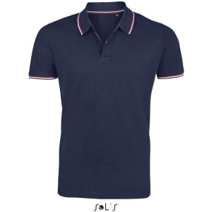 A navy polo shirt with red and white trim, made from 100% cotton, featuring a logo at the bottom.