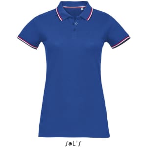 A women's polo shirt in royal blue with contrasting red and white stripes on the collar. Features a logo.