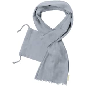 A grey scarf accompanied by a matching pouch for storage. The scarf has fringed edges.