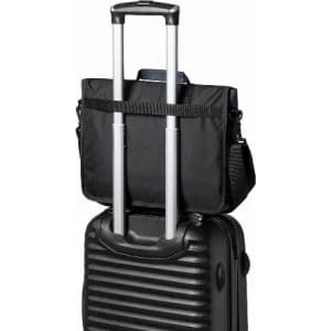 A black travel bag sits on top of a black suitcase, featuring extendable handles for easy transport.