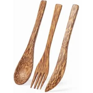 A set of three wooden utensils in a natural brown colour, including a spoon, fork, and knife. Each has a textured finish.