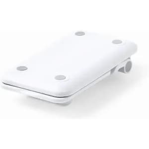 A portable white device with rounded edges and four suction pads on top, designed for convenient use.