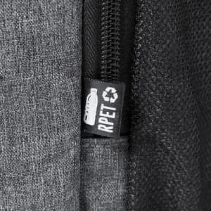 A drink bottle in grey fabric with a zipper and a tag indicating it’s made from recycled materials.