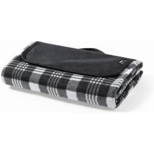 A folded blanket featuring a black and white checkered pattern, with a black fabric cover and strap.