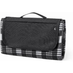 A picnic blanket featuring a black and white checkered pattern, folded with a handle for easy carrying.