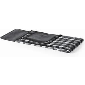 A picnic blanket in a black and white checkered pattern, folded neatly with a black carrying pouch.