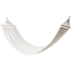 A hammock in neutral tones, featuring a smooth fabric design and sturdy rope ends for hanging.