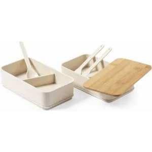 A set of two storage containers in cream with bamboo lids and matching spoons.