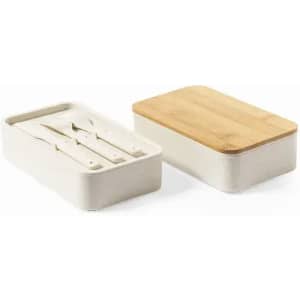A storage box with a wooden lid and a white base, containing utensils inside.