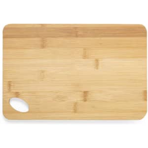 A bamboo cutting board featuring a curved handle on one side, showcasing a natural wood finish.