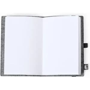 A grey felt notebook with blank white pages open to a spread. It features a small tag on the side.
