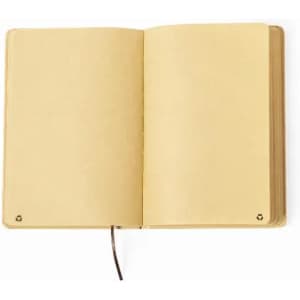 An open notebook with blank, yellowish pages and a brown ribbon bookmark. The notebook has no visible branding.