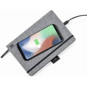 A grey charging pad with a smartphone on top, displaying a charging icon and connected by a cable.